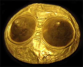 golden pectoral with female breasts
